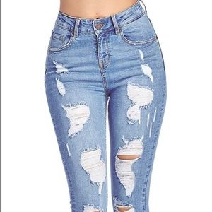 High waisted distressed jeans